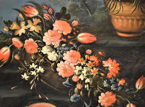 Natura morta di fiori e anguria all’aperto in un giardino